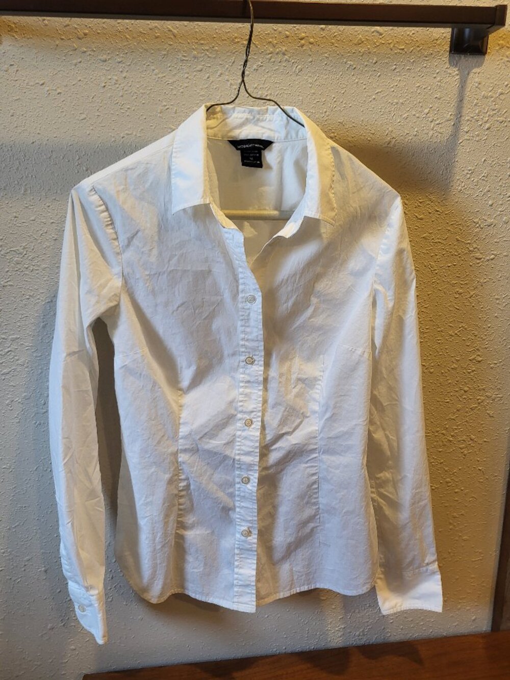 Women's white long sleeve button down shirt, Medium.